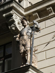 sculpture of knight with sword