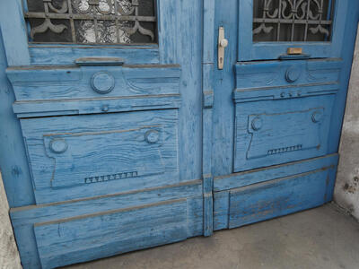 weathered blue painted doors