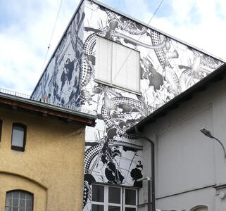 black and white artwork on building