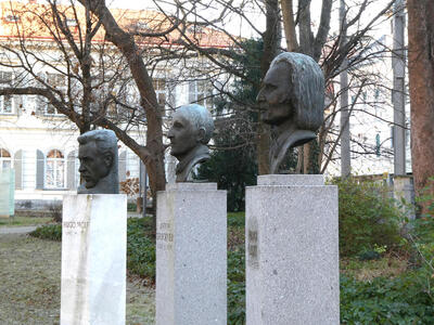 Busts of Hugo Wolf, Anton Bruckner, and Franz Liszt.