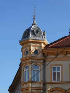 corner of building with ornate spire