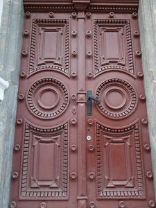 ornate dark brown wooden door