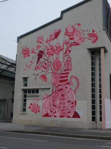 pink flowers on building