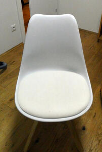 white curvy chair