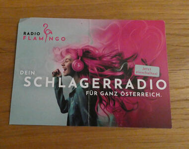 Front of advert card for Radio Flamingo