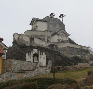 Back view of church built on a steep hill