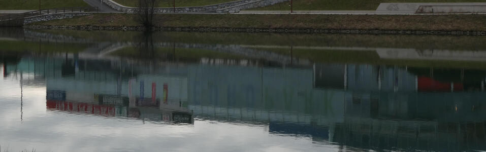 shopping center reflected in water