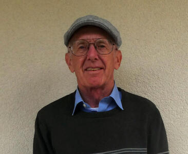 me in a gray European-style cap, facing camera