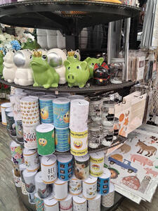 small kitschy figurines and coffee mugs