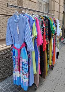 rack of colorful dresses