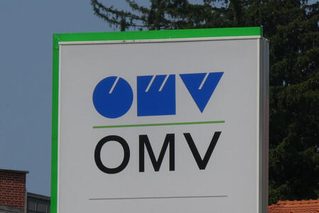 Stylized block-style letters OMV; beneath them, OMV in plain font.