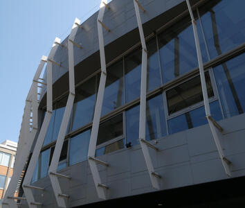 building with angled beams over windows