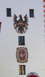 Symbols of Austria and Leoben on wall