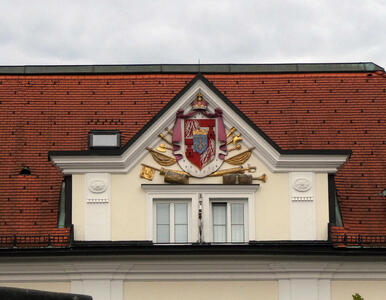 heraldic shield on roof