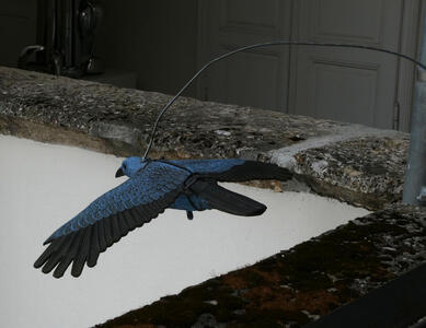 sculpture of blue bird