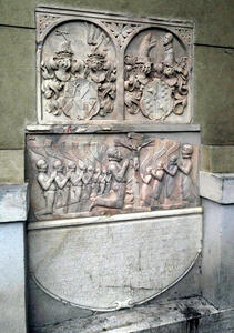 reliefwork people praying before christ on cross