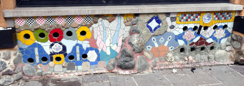 Abstract mosaic at base of window