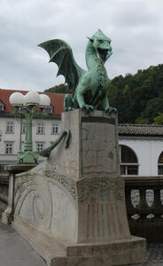 Sculpture of dragon at head of bridge