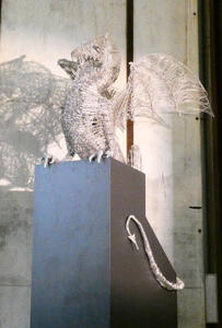 Metal wireframe sculpture of dragon