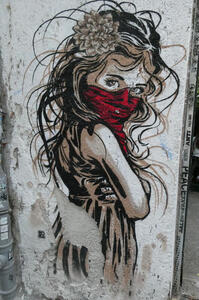 Sepia tone drawing of young woman with flower in hair, wearing a red bandana face mask