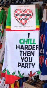 Souvenir socks with text: I CHILL HARDER THEN YOU PARTY
