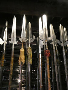 spears with colored yarn tassels