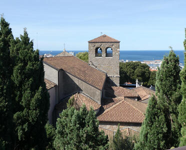 View of old brick buildings with slate roof tiles