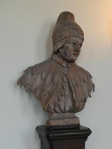 Bust of man in medieval style hat