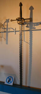 Sword with a blade that has “waves” on the edges. It is called a “flame blade”