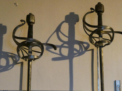 Intricately curved sword handles