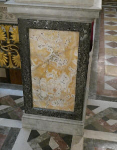Patterned marble at base of a statue