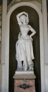 Ballet dancer with flowers wrapped around her waist