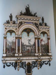 Triptych of an arena; the frame is three archways as if looking into the arena