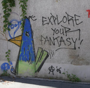 Drawing of bird with blue head, green body, and yellow beak. Next to it, the words “Explore your fantasy!”
