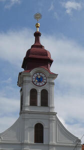 Church steeple with clock beneath
