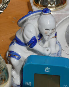 Small blue and white ceramic of a chinese man