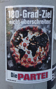 Poster with a pizza that has burnt portions looking like a map of the world. Text: 180-Grad-Ziel nicht überschreiten! Die Partei