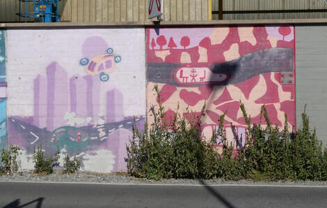 Two panels of a wall painting. One has a landscape with an animal. Inside the animal are a person and two chairs.  The other panel shows a cityscape with a flying car above it.