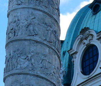 Closeup of carving showing reliefwork of religious scenes.