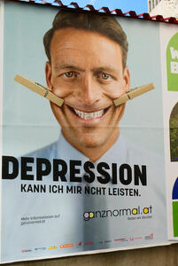 Photo of man with clothespins holding his mouth into a smile. Text: Depression kann ich mir nicht leisten.
