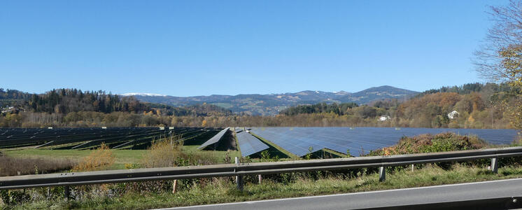 Large array of solar panels in a field