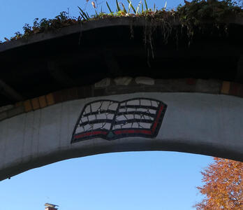 Arch with open book design