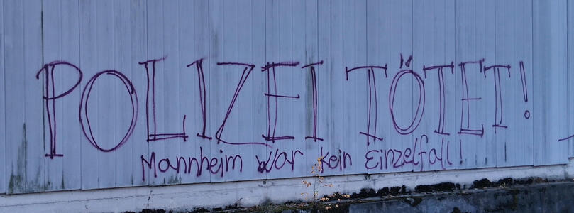 Spray-painted on a wall: POLIZEI TÖTET! Mannheim war kein Einzelfall!