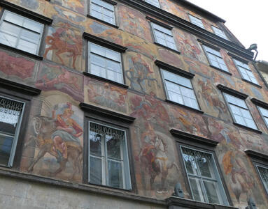Frescoes of Roman-style knights on horseback