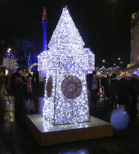 Model of Uhrturm lit up with blue lights