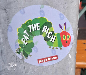 Drawing of “The Very Hungry Caterpillar”. Text on the body of the caterpillar is EAT THE RICH