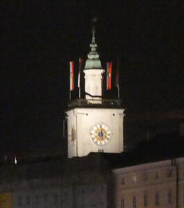 Clock tower illuminated at night
