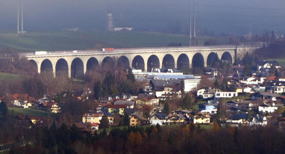 Roadway bridge with stone arches
