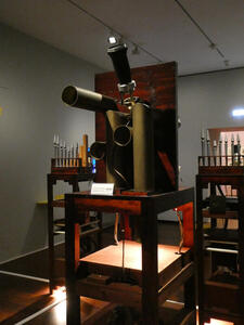 Machine with pipe organ pipes sticking out of the top