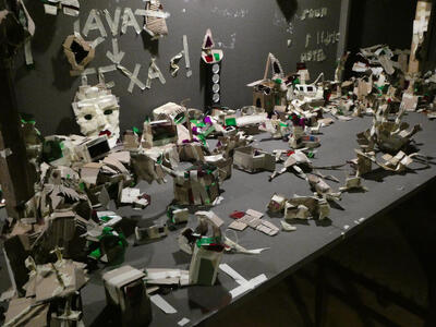 Closeup of cardboard artworks.